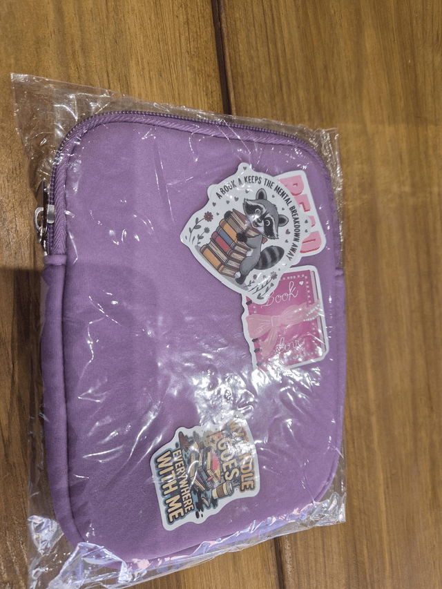 Kindle Neoprene Pink Pouch by Merch — book cover