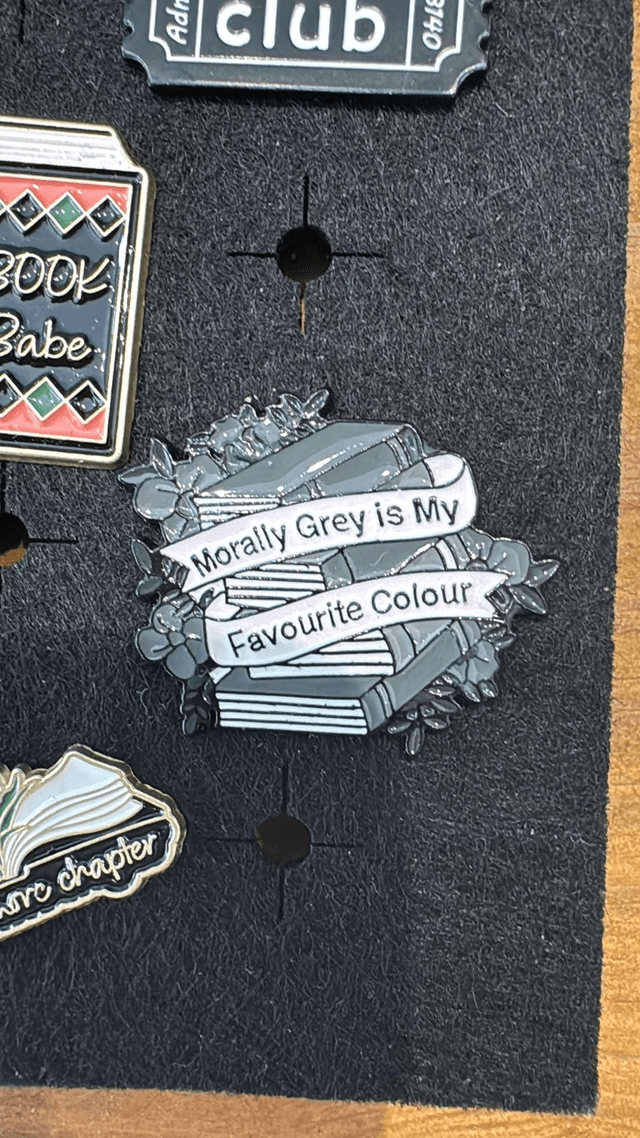 Pin Badge by Merch — book cover