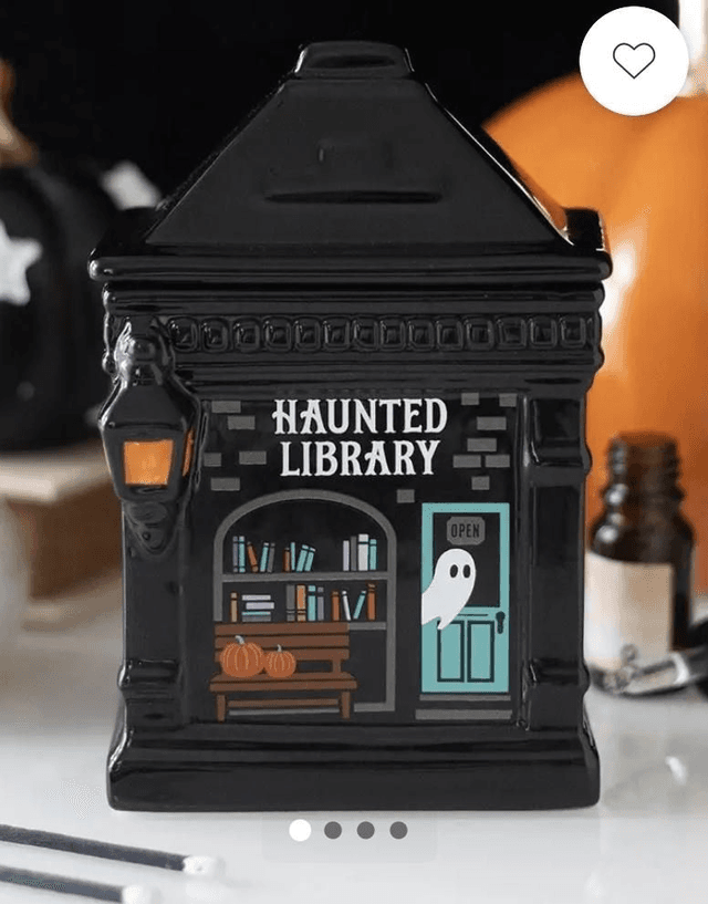 Wax Melt Burner – Haunted Library by Merch — book cover