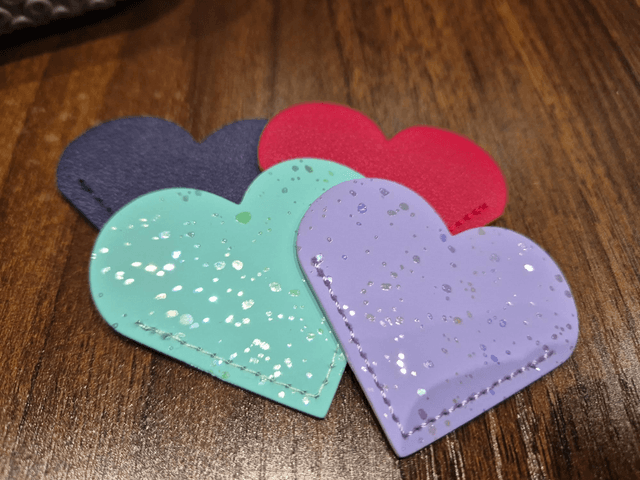 Heart Shaped Corner Bookmark by Merch — book cover