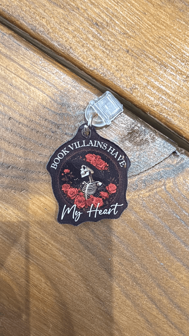 Kindle Dust Cap Charm by Merch — book cover