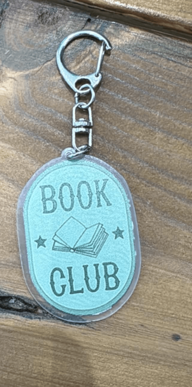 Acrylic Keyring by Merch — book cover
