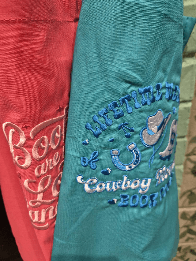 Embroidered Tote Bag by Merch — book cover