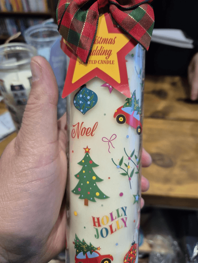 Christmas Pudding Pillar Candle by Merch — book cover