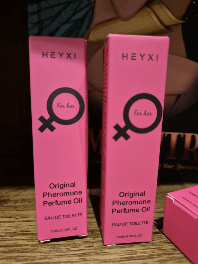 Pheromone Perfume Oil by Merch — book cover
