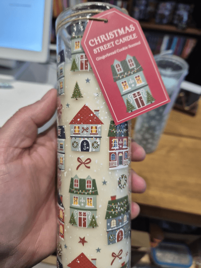 Christmas Street Pillar Candle by Merch — book cover