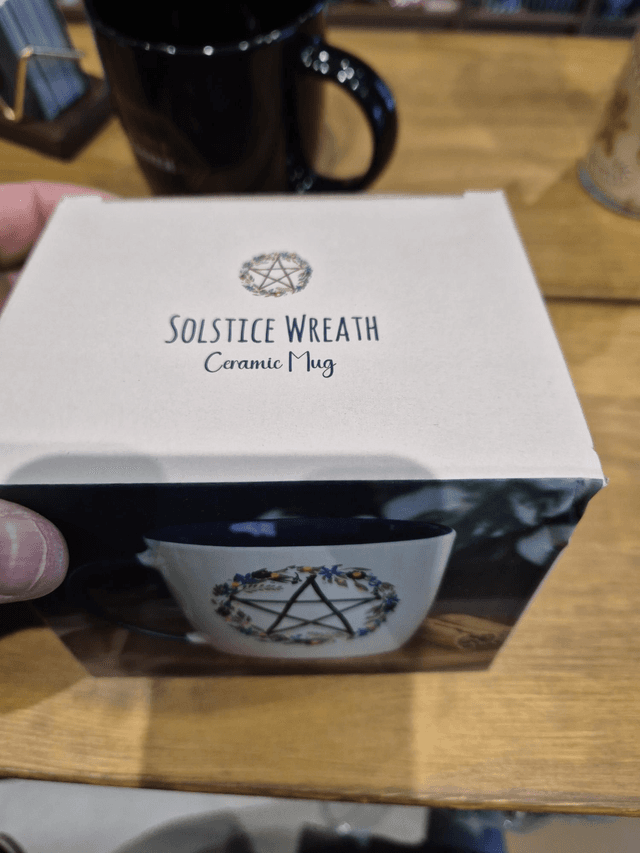 Solstice Weave Mug by Merch — book cover
