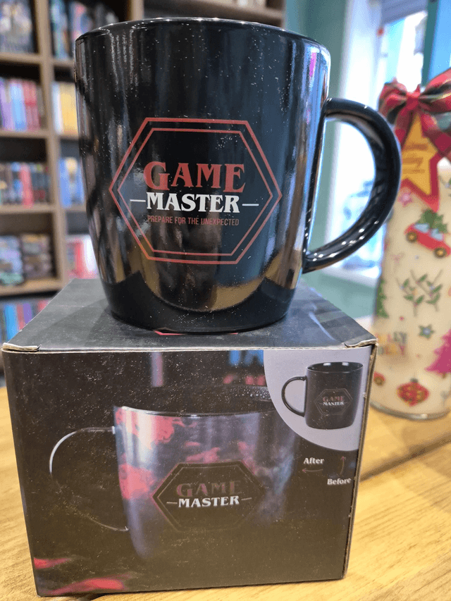Colour Changing GAME Mug by Merch — book cover