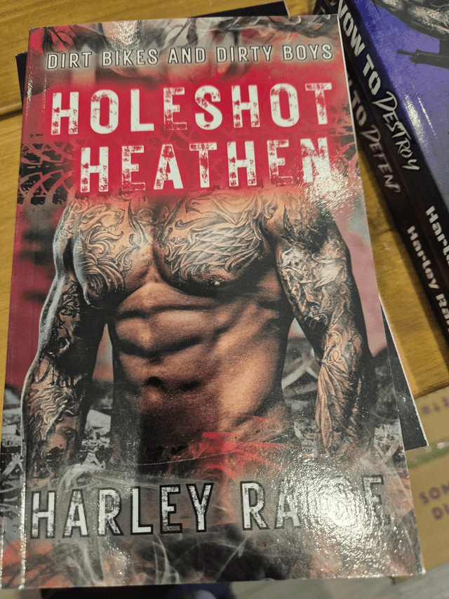 Holeshot heathen by Harley Raige — book cover